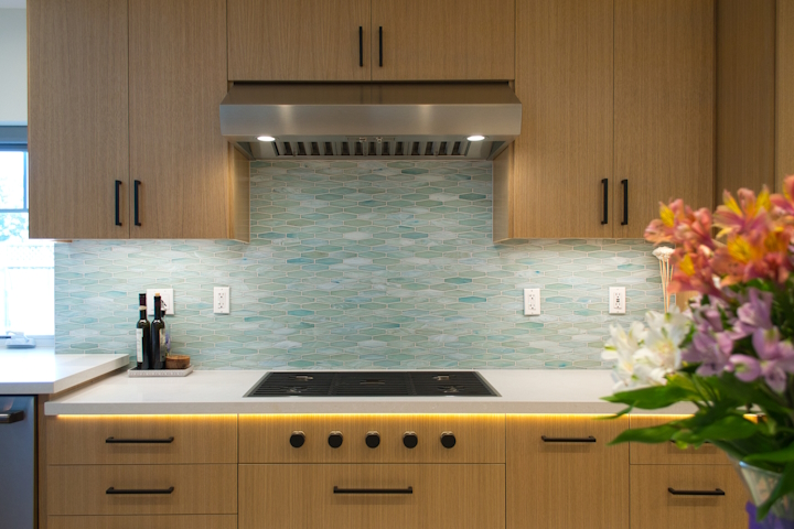 Custom wood kitchen cabinet wall with tile backsplash